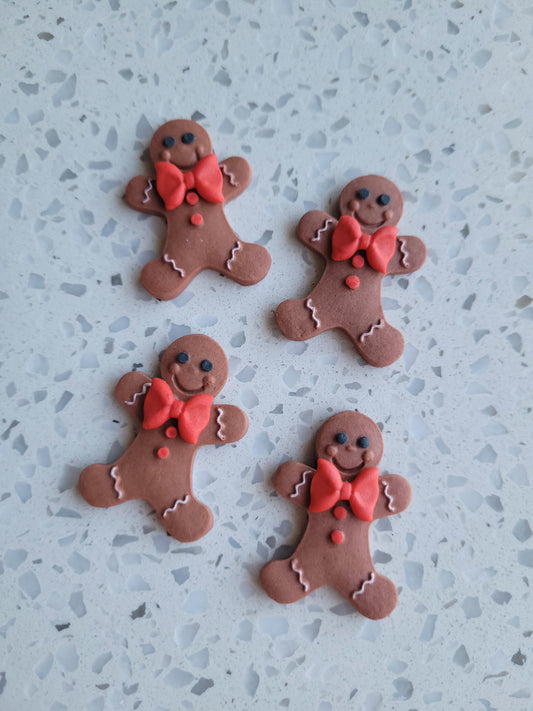 Gingerbread Man Red Bow 4pcs Edible Cake Decorations